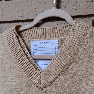 Sleeveless oversized sweater